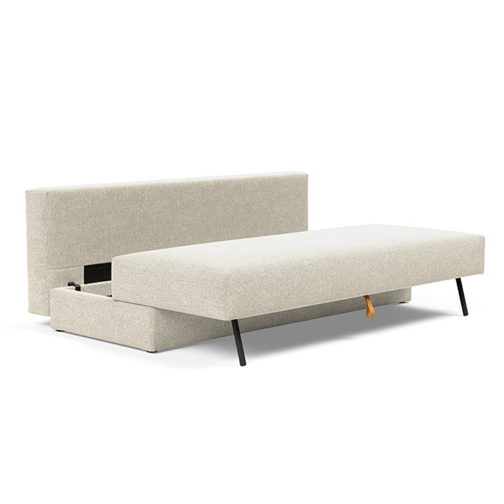 The Osvald Sofa Bed from Innovation Living with taura off white 357 upholstery showing the storage inside the couch.
