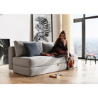 The Osvald Sofa Bed from Innovation Living with taura slate grey 351 upholstery in a living room.