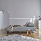 The Osvald Sofa Bed from Innovation Living with twist granite 565 upholstery in a family space.