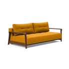 The Ran D.E.L Sofa Bed from Innovation Living with elegance burned curry 507 upholstery setup as a sofa.