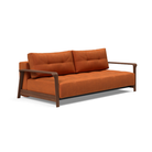The Ran D.E.L Sofa Bed from Innovation Living with esina rust orange 412 upholstery setup as a sofa.