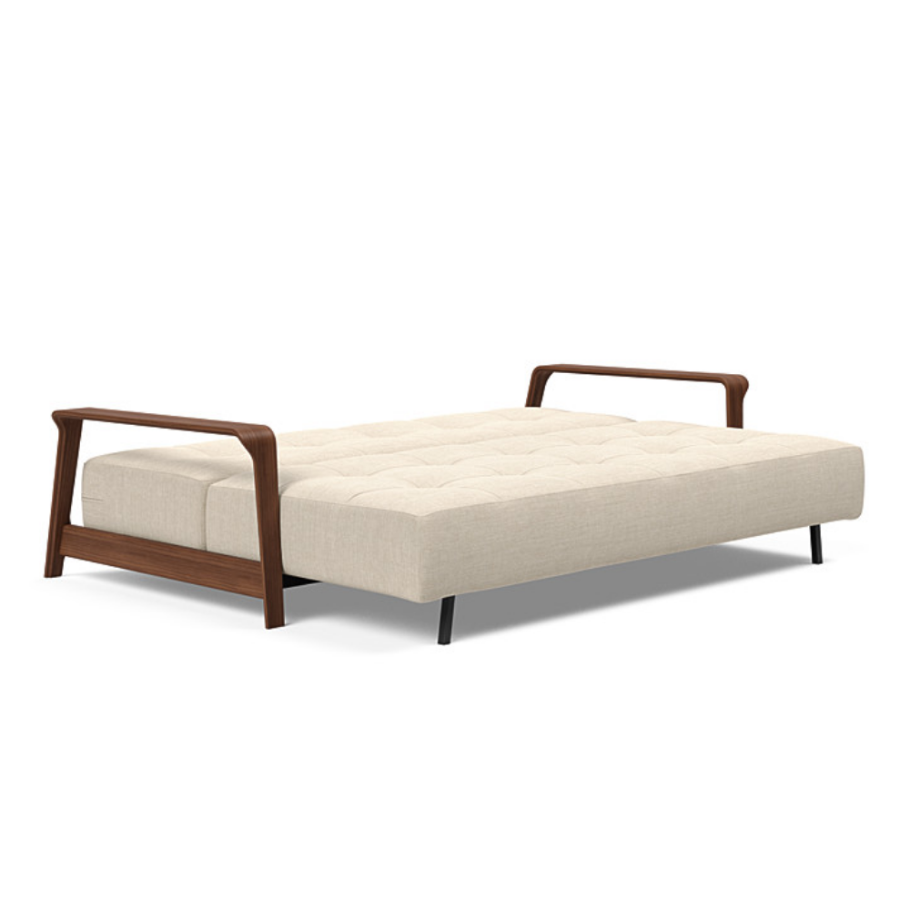 The Ran D.E.L Sofa Bed from Innovation Living with phobos latte 586 upholstery setup as a bed.