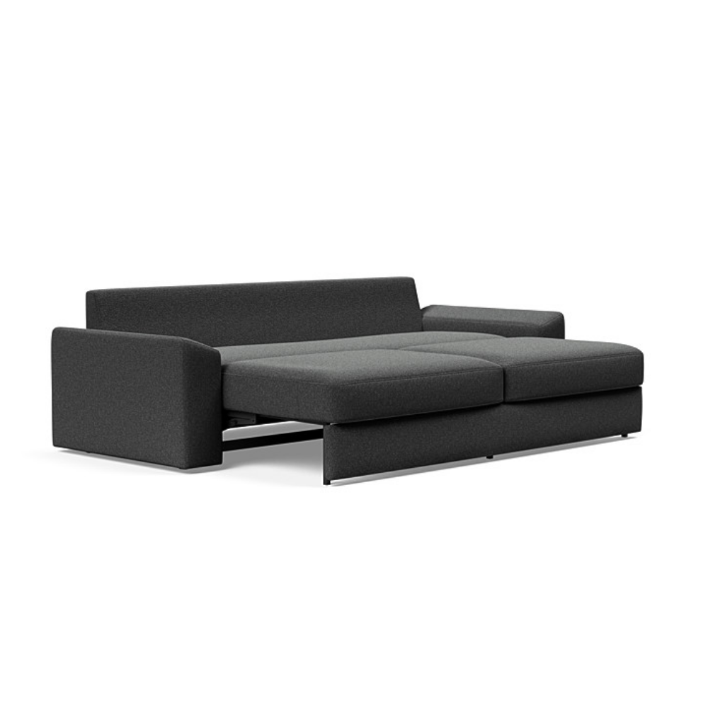 The Vilander Sleeper Sofa With Cushion Arms from Innovation Living with boucle charcoal 529 upholstery setup as a bed.