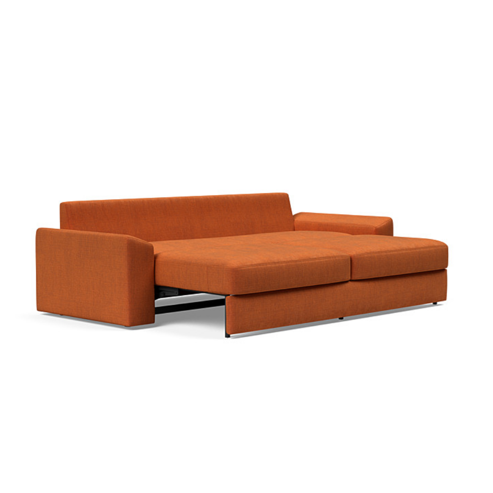 The Vilander Sleeper Sofa With Cushion Arms from Innovation Living with esina rust orange 412 upholstery setup as a bed.
