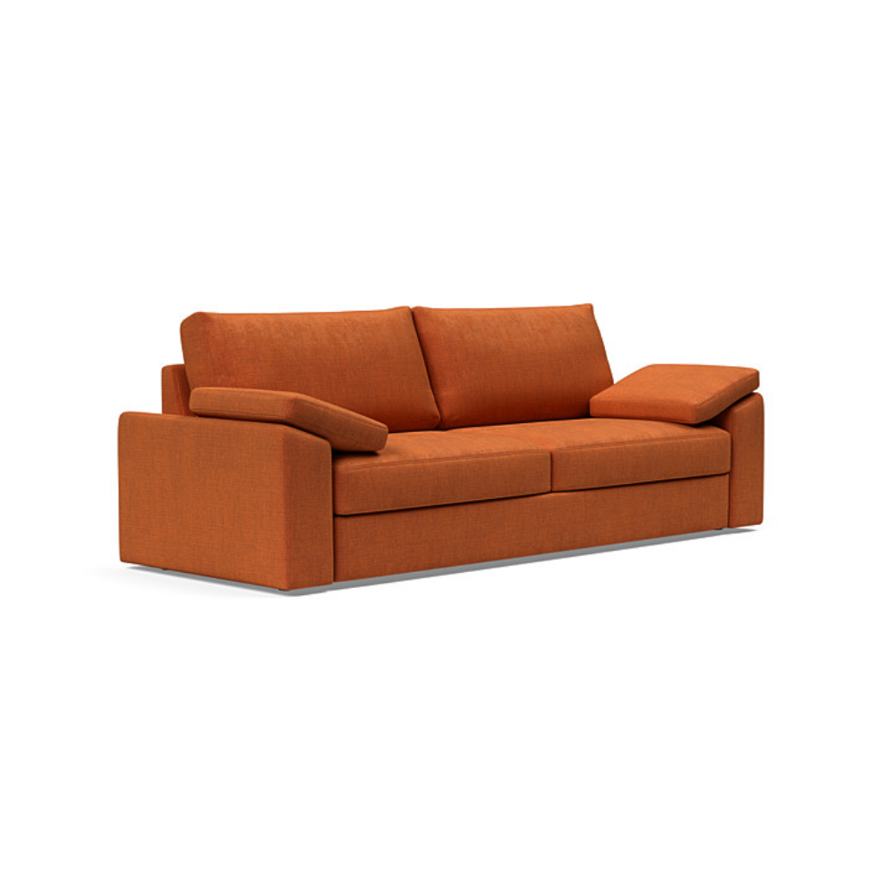 The Vilander Sleeper Sofa With Cushion Arms from Innovation Living with esina rust orange 412 upholstery setup as a couch.