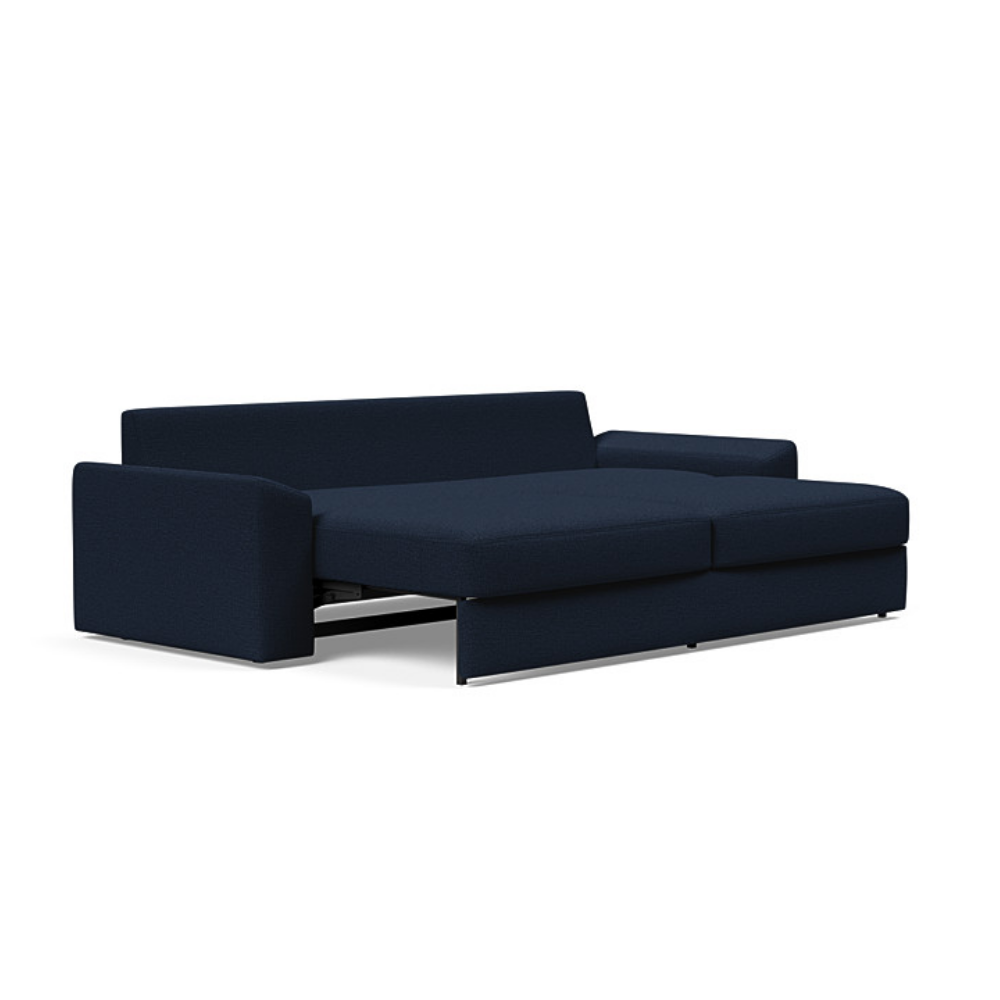 The Vilander Sleeper Sofa With Cushion Arms from Innovation Living with mixed dance blue 528 upholstery setup as a bed.