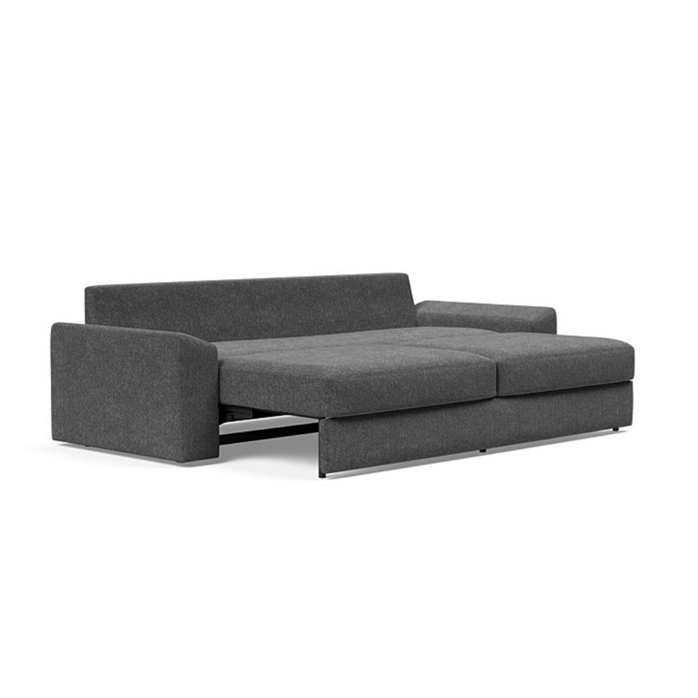 The Vilander Sleeper Sofa With Cushion Arms from Innovation Living with taura deep grey 350 upholstery setup as a bed.