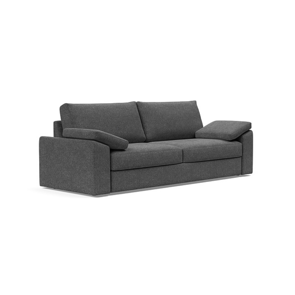 The Vilander Sleeper Sofa With Cushion Arms from Innovation Living with taura deep grey 350 upholstery setup as a couch.