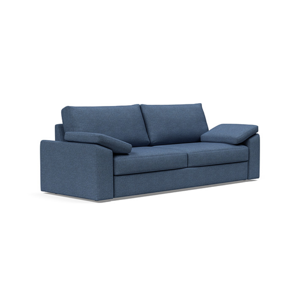 The Vilander Sleeper Sofa With Cushion Arms from Innovation Living with weda blue 302 upholstery setup as a couch.
