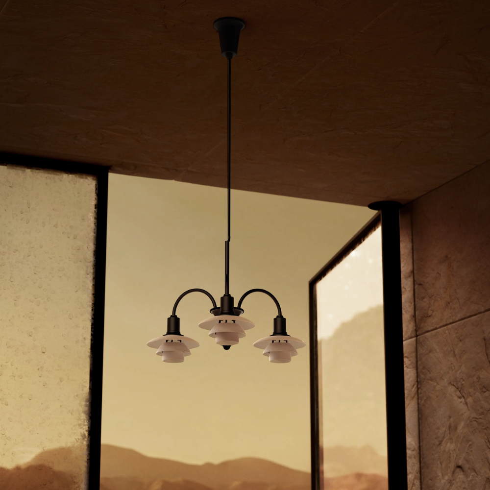 Campaign photo of the PH 1/1 Chandelier, 3-Light by Louis Poulsen turned off.