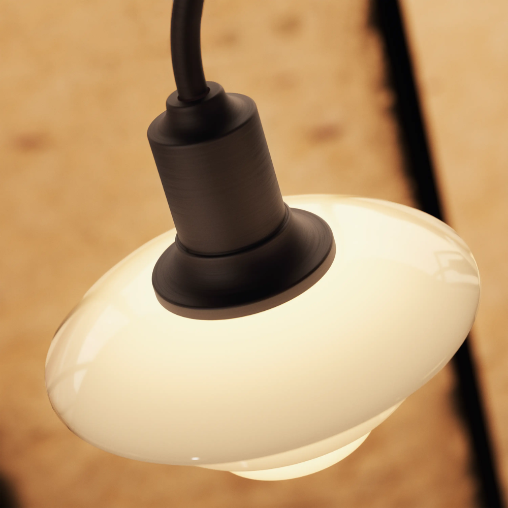 Shade detail of the PH 1/1 Chandelier, 3-Light by Louis Poulsen turned on.