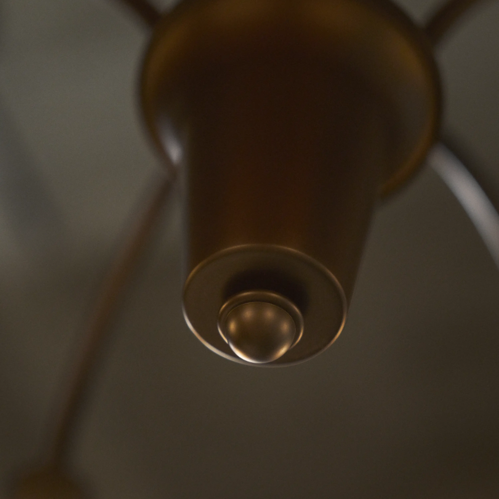 Brass detail of the PH 1/1 Chandelier, 9-Light by Louis Poulsen.