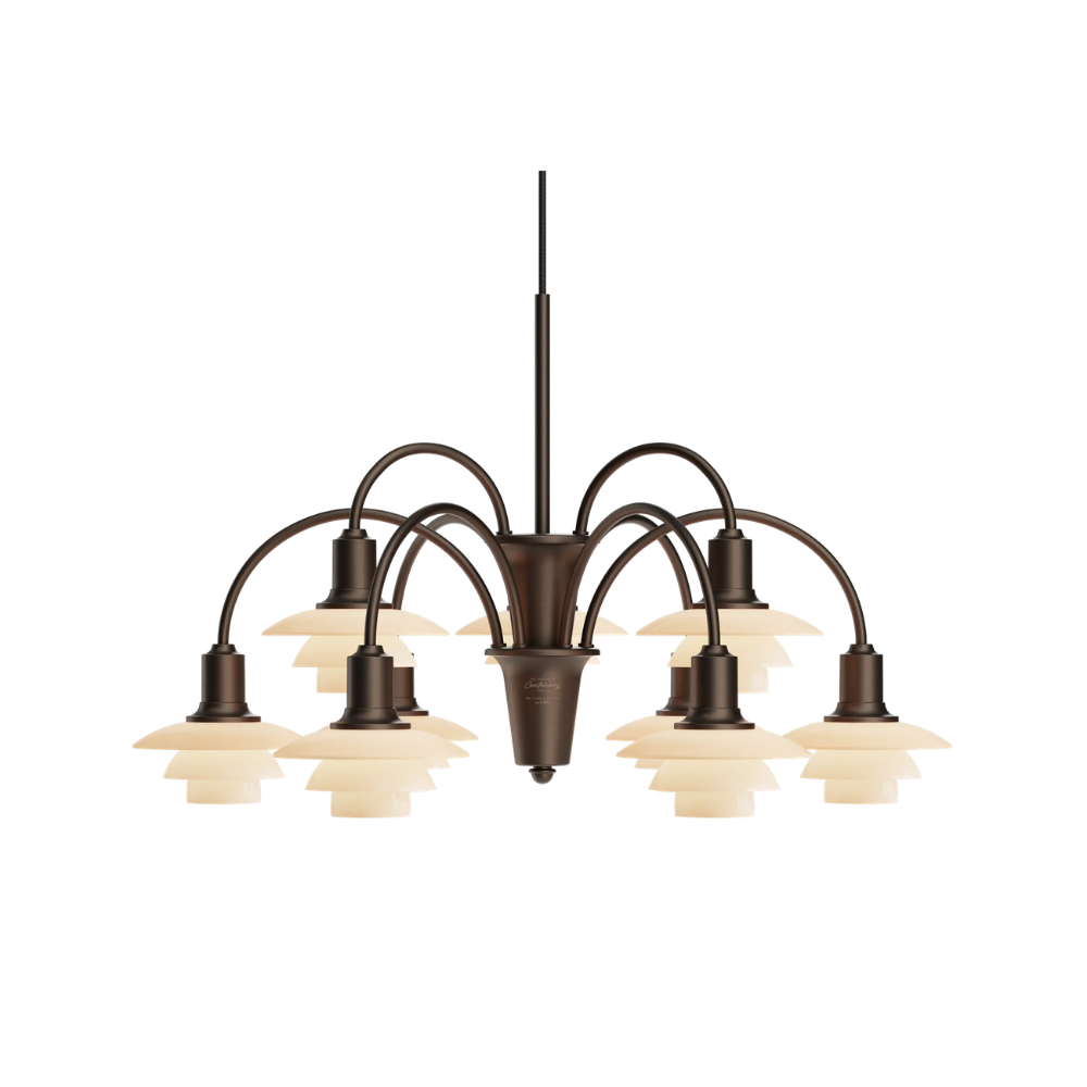 The PH 1/1 Chandelier, 9-Light by Louis Poulsen turned on.