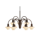 The PH 1/1 Chandelier, 9-Light by Louis Poulsen turned on.