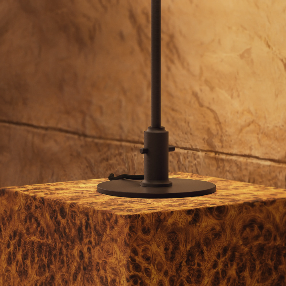 Close up of the through switch controls at the base of the PH 3/2 Table Lamp Centenary Edition by Louis Poulsen.
