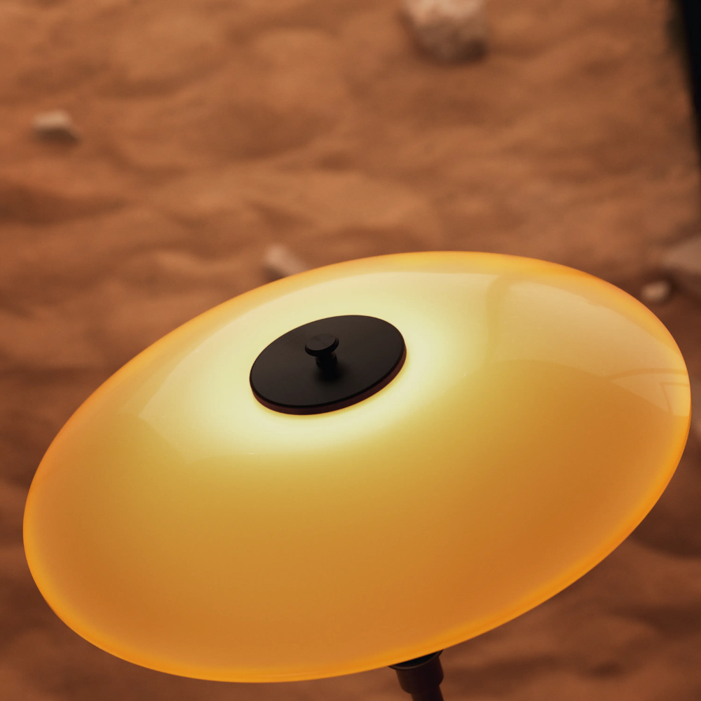 Detailed image of the amber shade of the PH 3½-2½ Floor Lamp Centenary Edition by Louis Poulsen.