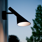 The AJ 50 Wall from Louis Poulsen used as an outdoor wall sconce.