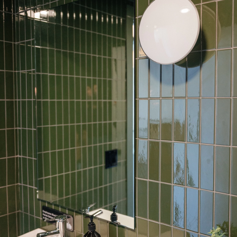 The AJ Eklipta Surface from Louis Poulsen in size small (8.7 inch) in a bathroom.