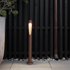 The Flindt Garden Bollard, crafted by renowned Danish designer Christian Flindt with Louis Poulsen, offers premier outdoor illumination for spaces like parks, courtyards, and gardens without sacrificing light quality or design. 