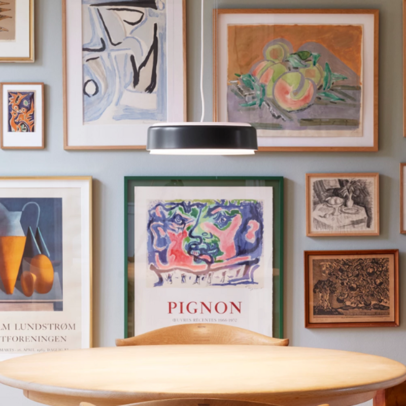 The LP Grand Suspended from Louis Poulsen in a living room.