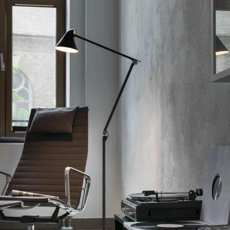 The NJP Floor Lamp from Louis Poulsen in a home office.