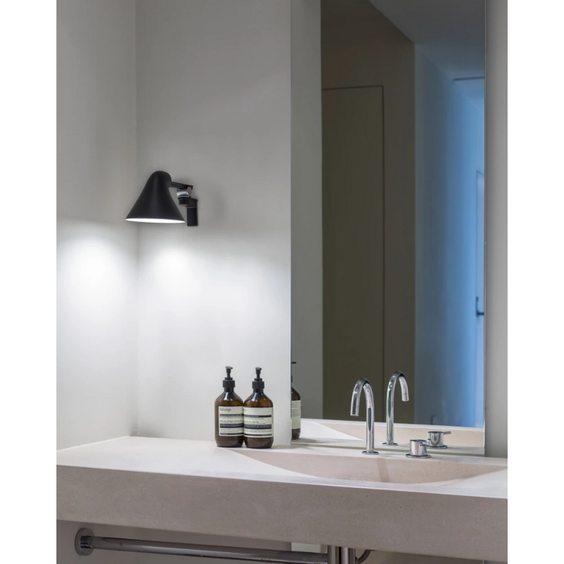 The NJP Wall from Louis Poulsen within a bathroom.