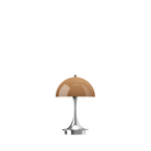 The Panthella 160 Portable Lamp from Louis Poulsen in Original Opal Brown turned on.