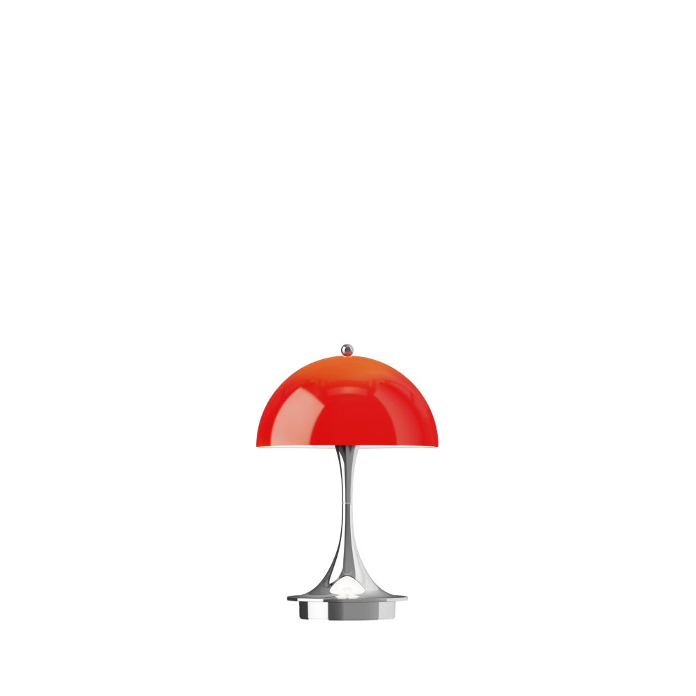 The Panthella 160 Portable Lamp from Louis Poulsen in Original Opal Red turned on.