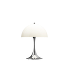 The Panthella 250 Portable Table Lamp from Louis Poulsen in Chrome Opal Beige turned on.