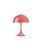 The Panthella 250 Portable Table Lamp from Louis Poulsen in Coral.