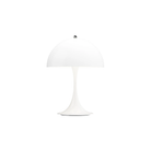 The Panthella 250 Portable Table Lamp from Louis Poulsen in Opal White turned on.