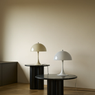 The Panthella 320 Table Lamp from Louis Poulsen in Opal Beige and Opal White turned off.