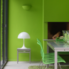 The Panthella 320 Table Lamp from Louis Poulsen in a dining room.