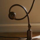 Detail image of the stem detail of the PH 1/1 Piano Table Lamp by Louis Poulsen.