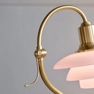 The PH 2/2 Question Mark Pale Rose Table Lamp from Louis Poulsen close up showcasing the lighting design.