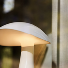Rumee 220 Portable Lamp in Cloud White turned on.