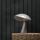 Rumee 220 Portable Lamp in Earth Grey  turned off.