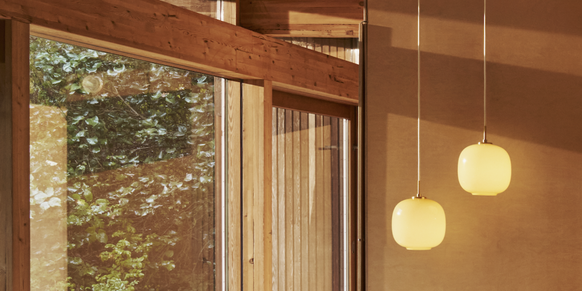 The VL Radiohus Pendant in Amber by Louis Poulsen.