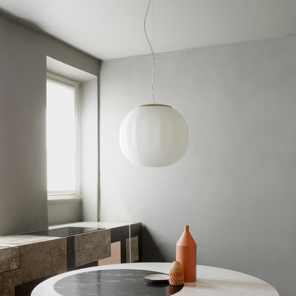 The Lita Pendant by Luceplan, 16.5-inch  pendant in ash wood in kitchen.