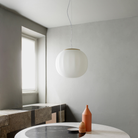 The Lita Pendant by Luceplan, 16.5-inch  pendant in ash wood in kitchen.