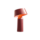 The Bicoca Portable Table Lamp from Marset in red wine.