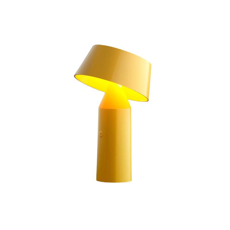 The Bicoca Portable Table Lamp from Marset in yellow.