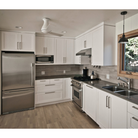 The 42" size of the Altus Flush from Modern Fan Co. in a kitchen.