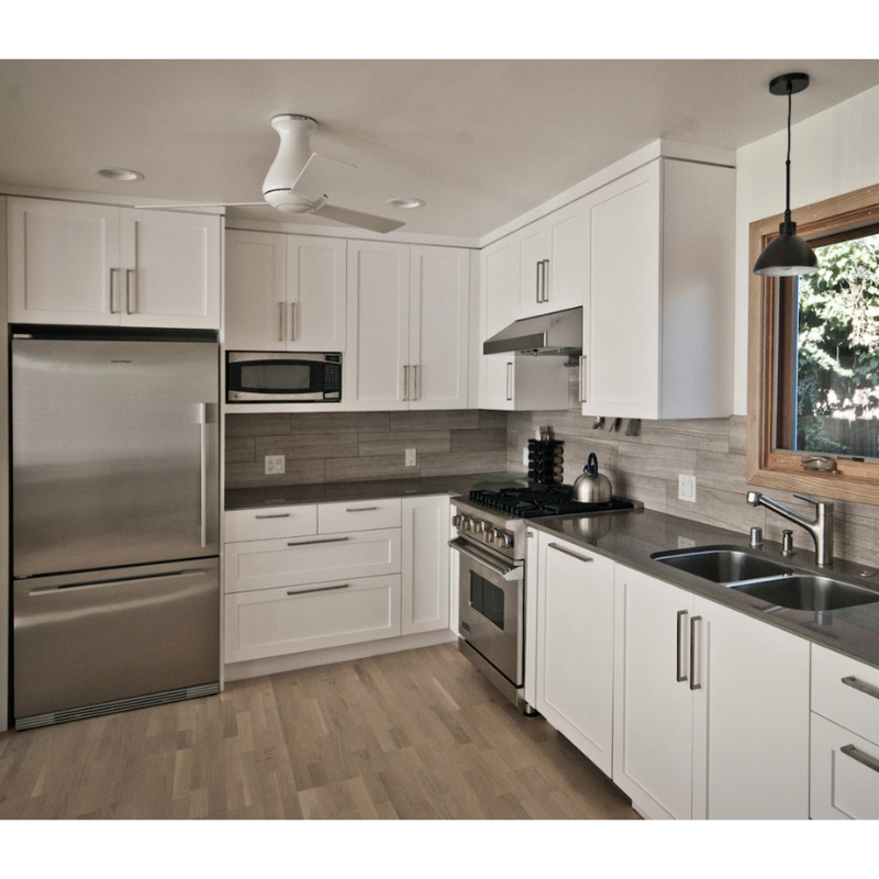 The 42" size of the Altus Flush from Modern Fan Co. in a kitchen.