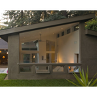 The Altus ceiling fan from The Modern Fan Co. in a living room from a shot taken outside of the home.