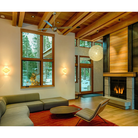 The Ball ceiling fan by Modern Fan Co. in a living room above the sofa.