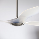 The bright nickel and translucent IC/Brisa DC - 56″ from Modern Fan Co. shown in detail within a living space.