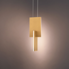 The aged brass Amari Pendant Light from Modern Forms in a lounge.
