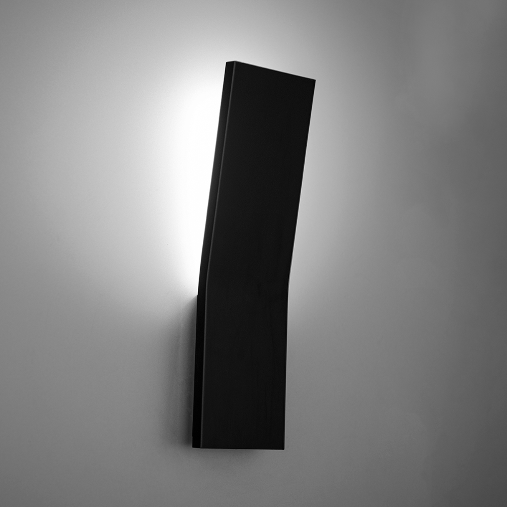 The black Blade Wall Sconce from Modern Forms in a living room.