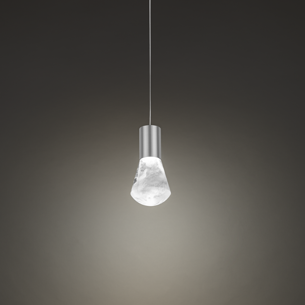 The satin nickel Plum Pendant Light from Modern Forms in a living room.
